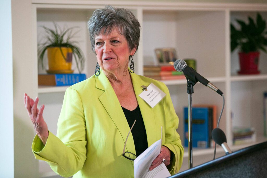 Linda Grant, CEO of Evergreen Recovery Centers, speaks during a ceremony celebrating the Evergreen Manor Family Services Center on Tuesday, Oct. 10, 2023, in Everett, Washington. (Ryan Berry / The Herald)
