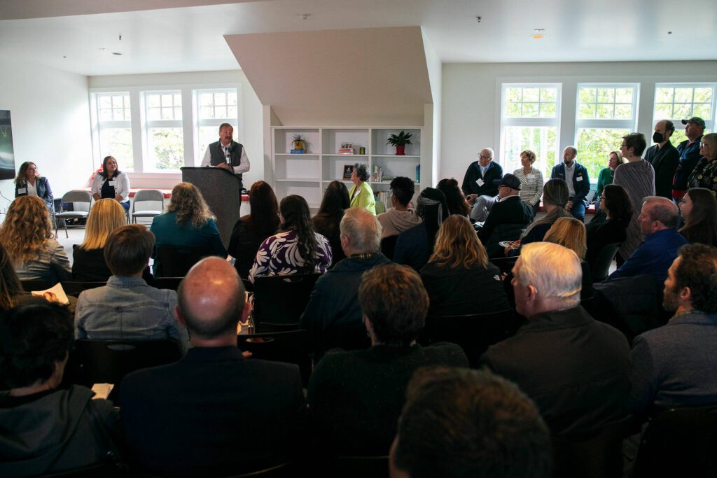 Snohomish County Executive Dave Somers speaks to a large gathering during a ceremony celebrating the Evergreen Manor Family Services Center on Tuesday, Oct. 10, 2023, in Everett, Washington. (Ryan Berry / The Herald)
