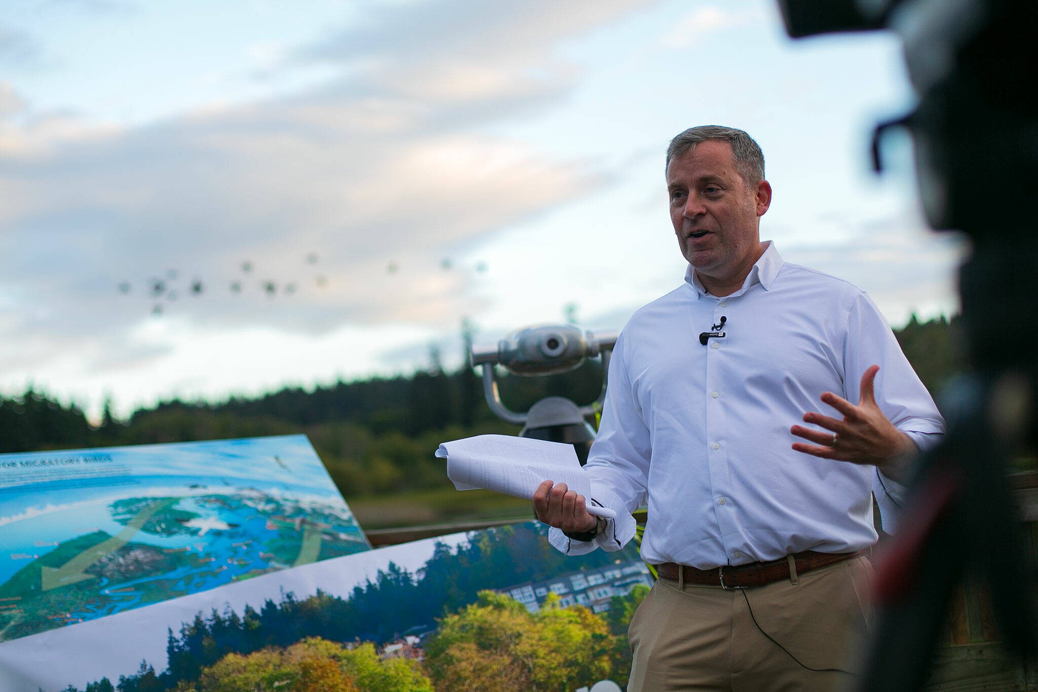 Edmonds Mayor Mike Nelson gives a brief press conference as geese fly by at the Edmonds Marsh on Tuesday, Sept. 19, 2023, in Edmonds, Washington. (Ryan Berry / The Herald)