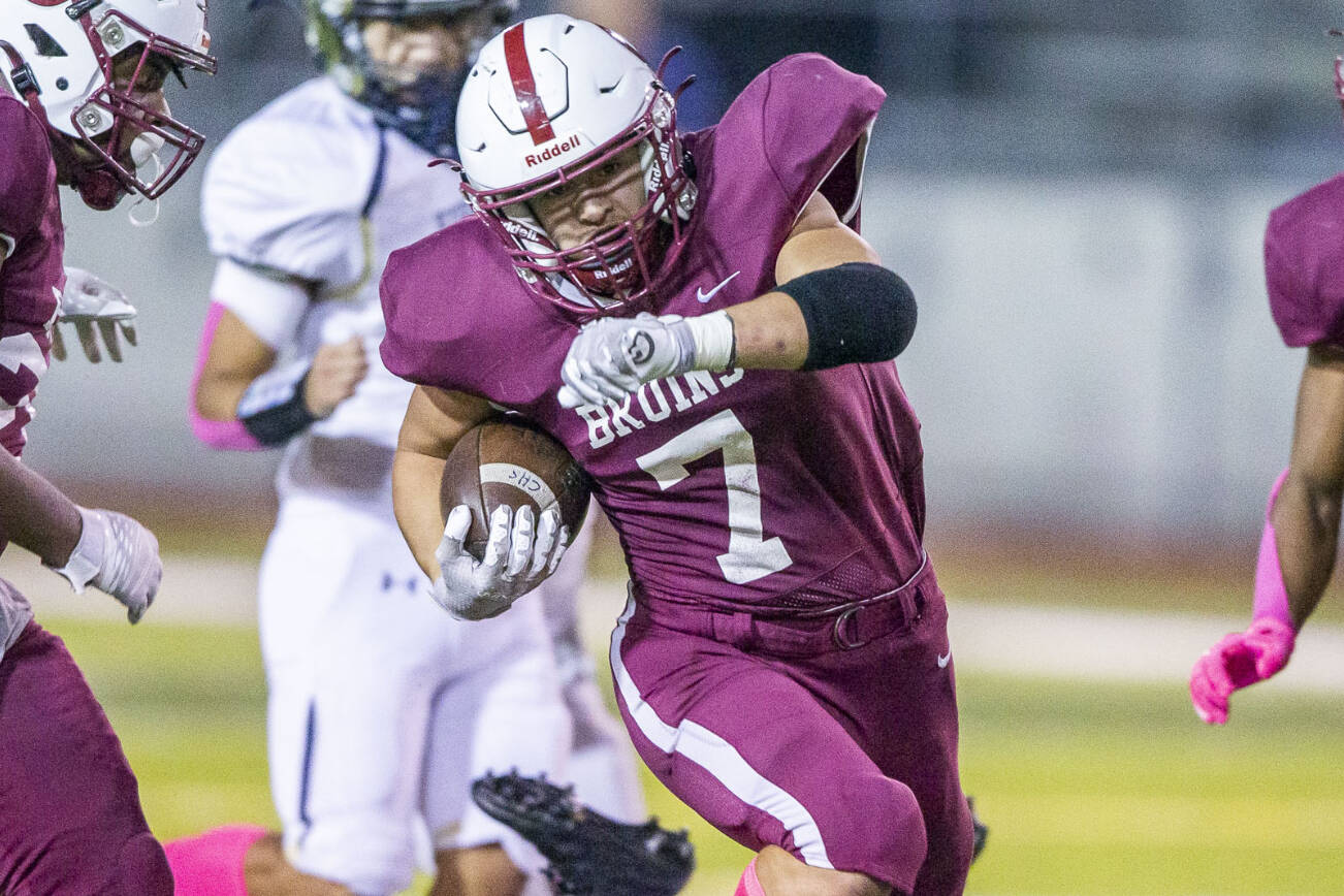 Cascade's Zachary Lopez breaks free of a tackle during the game against Everett on Friday, Oct. 6, 2023 in Everett, Washington. (Olivia Vanni / The Herald)
