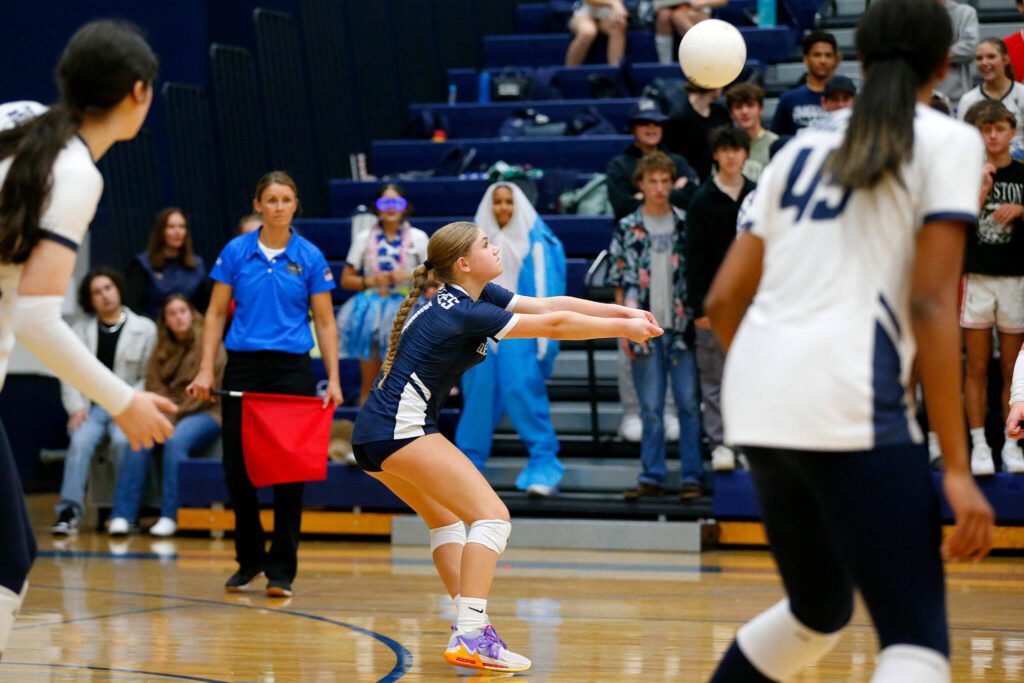 Glacier Peak libero Tessa Mossburg bumps the ball to a teammate against Lake Stevens on Tuesday, Oct. 10, 2023, at Glacier Peak High School in Snohomish, Washington. (Ryan Berry / The Herald)
