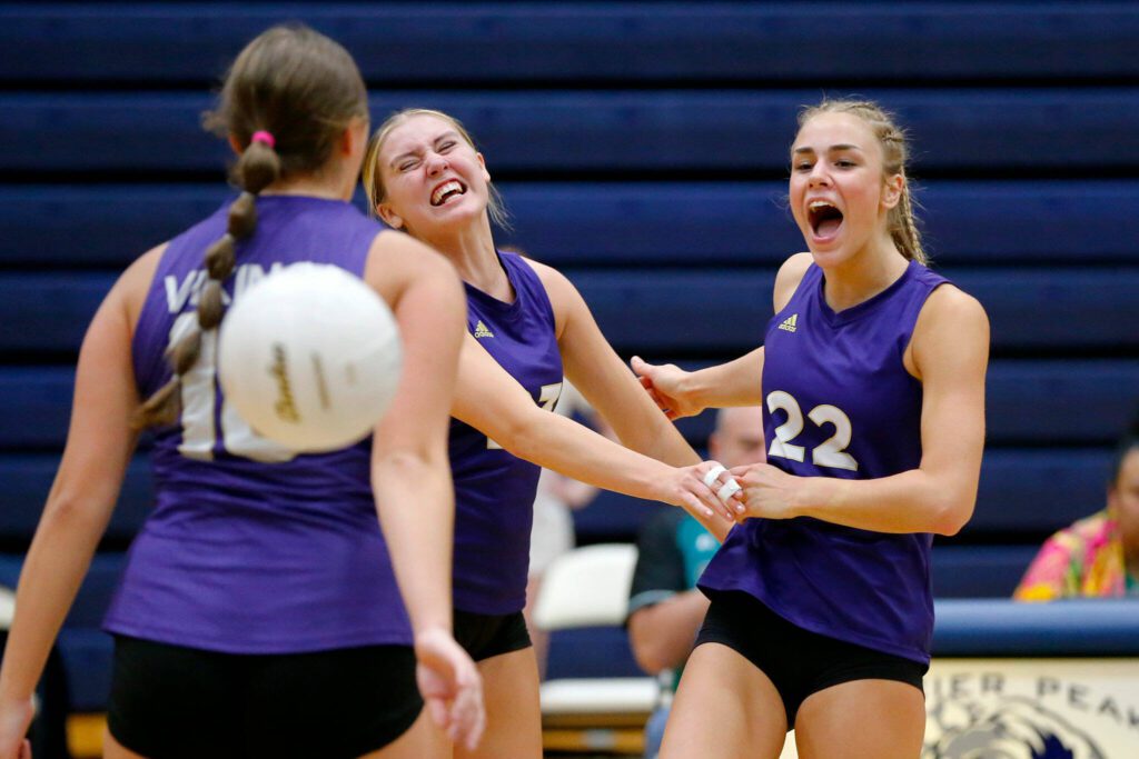 Lake Stevens celebrates a point against Glacier Peak on Tuesday, Oct. 10, 2023, at Glacier Peak High School in Snohomish, Washington. (Ryan Berry / The Herald)
