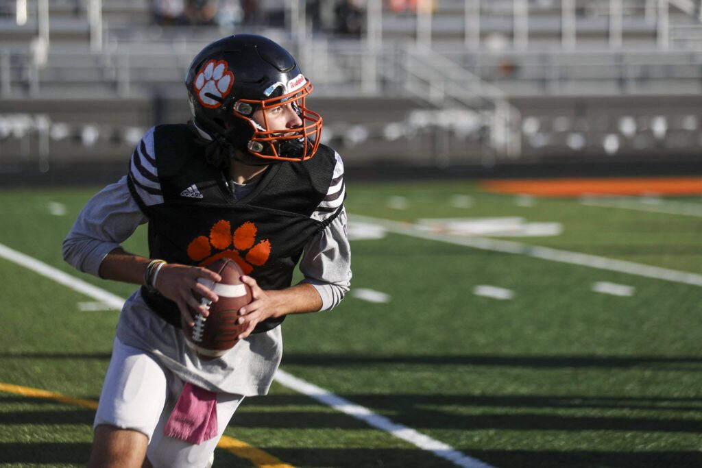 Senior quarterback Kaden LaPlaunt practices Wednesday at Granite Falls High School. (Annie Barker / The Herald)
