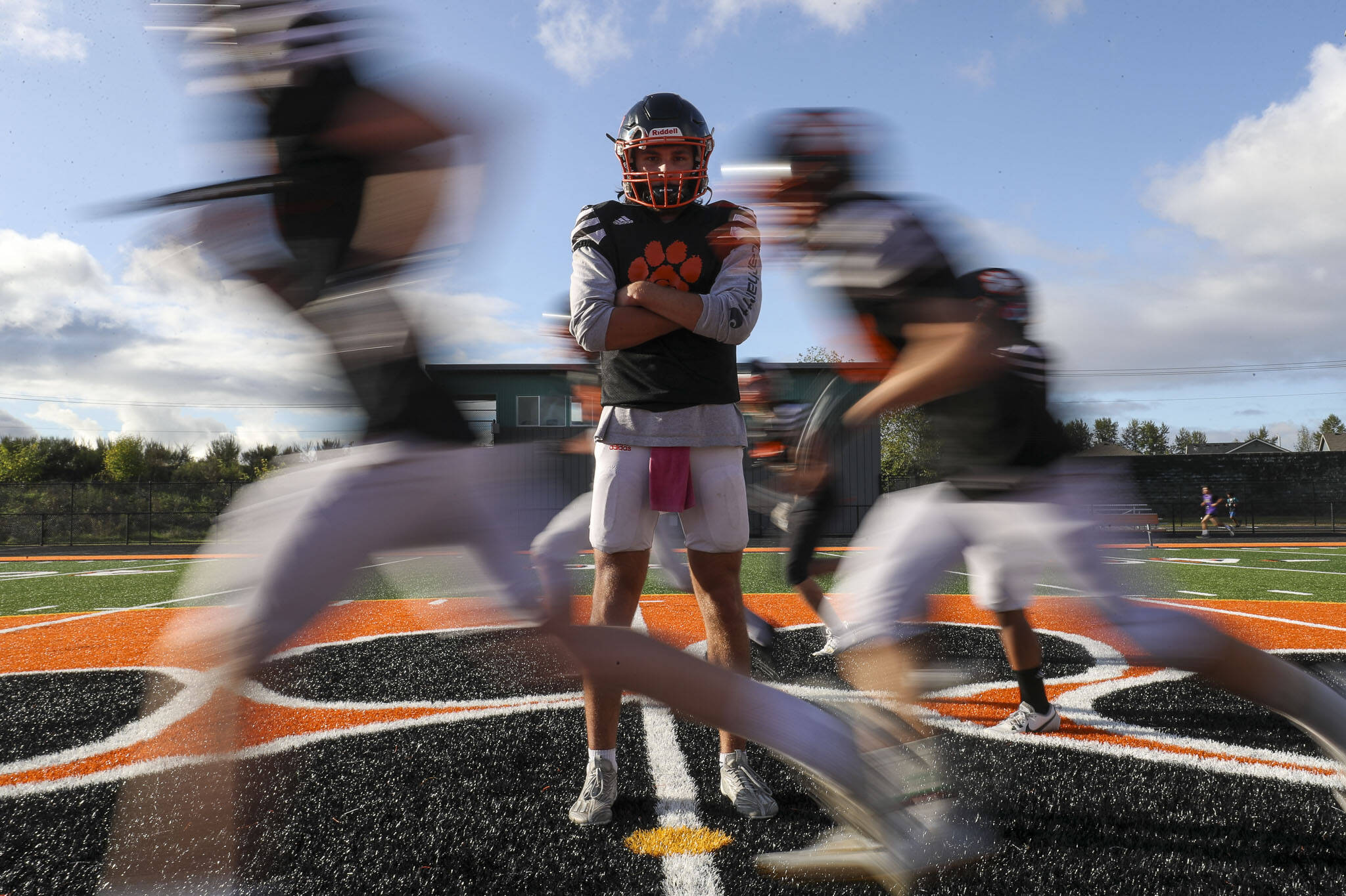 Senior quarterback Kaden LaPlaunt (8) poses for a portrait between practicing drills at Granite Falls High School in Grantie Falls, Washington on Wednesday, Oct. 11, 2023. (Annie Barker / The Herald)