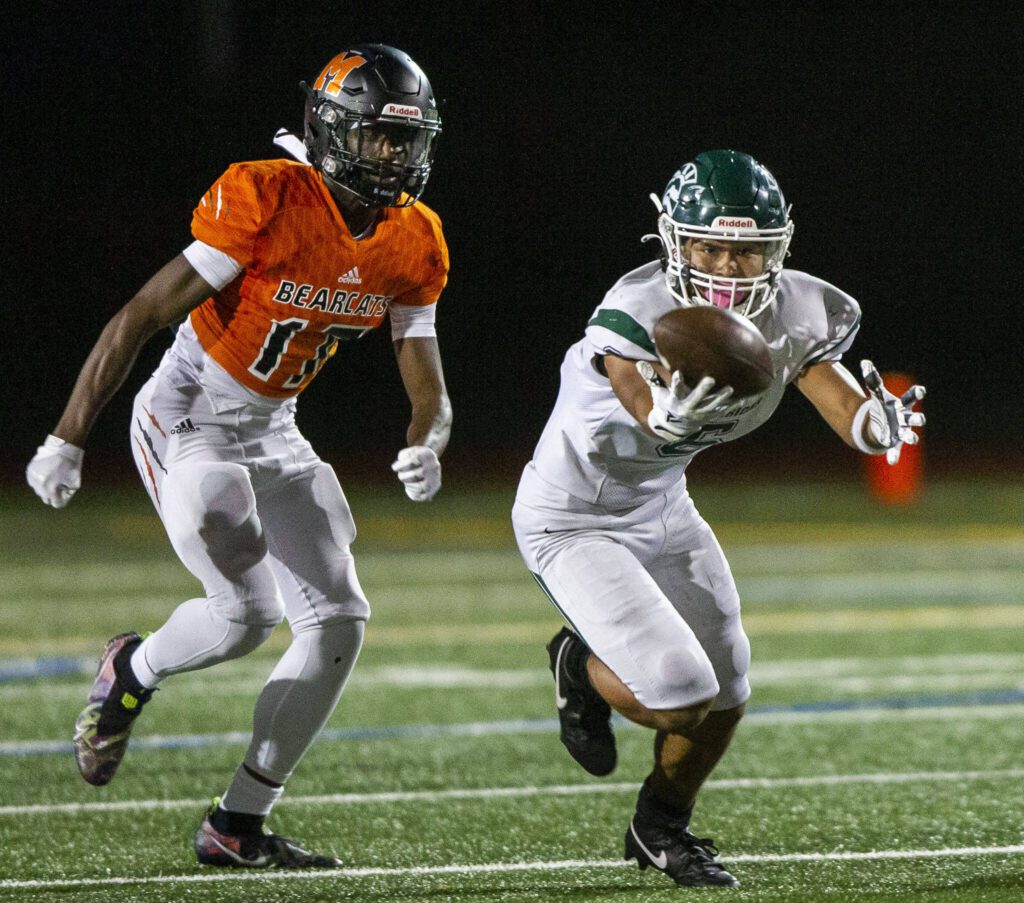 Edmonds-Woodway’s Jesse Hart reaches out to try and catch a pass that bounced off his helmet during the game against Monroe on Friday, Oct. 13, 2023 in Monroe, Washington. (Olivia Vanni / The Herald)
