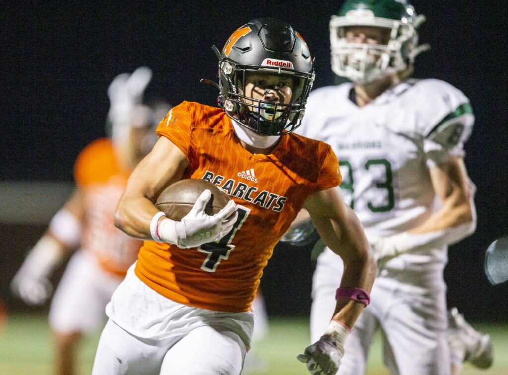 Monroe’s Gavin Ranz runs the ball in for a touchdown during the game against Edmonds-Woodway on Friday, Oct. 13, 2023 in Monroe, Washington. (Olivia Vanni / The Herald)

