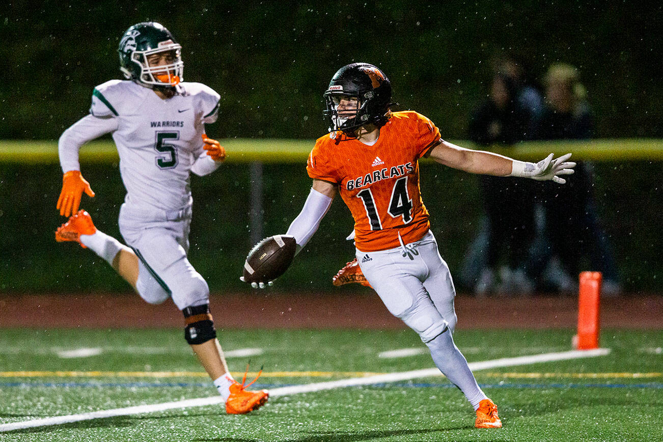 Monroe’s Ryan Miller runs the ball into the end zone for a touchdown during the game against Edmonds-Woodway on Friday, Oct. 13, 2023 in Monroe, Washington. (Olivia Vanni / The Herald)