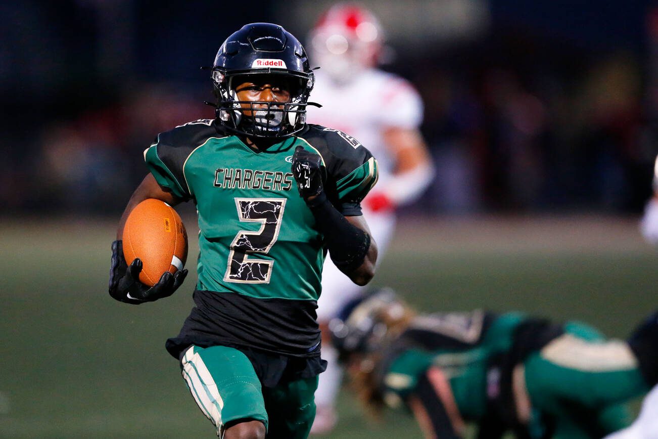 Marysville Getchell’s Shawn Etheridge takes a reverse handoff to the house against Marysville Pilchuck during the Berry Bowl on Friday, Sept. 15, 2023, at Quil Ceda Stadium in Marysville, Washington. The play was called back on a block in the back. (Ryan Berry / The Herald)