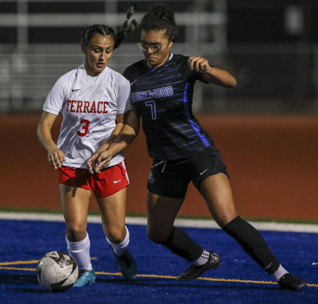 Shorewood’s Mia Ehdaie (7) and Mountlake Terrace’s Natalie Streuli (3) fight for the ball during a soccer game between Shorewood and Mountlake Terrace at Shorewood Stadium in Shoreline, Washington on Thursday, Oct. 19, 2023. Shorewood won, 4-0. (Annie Barker / The Herald)
