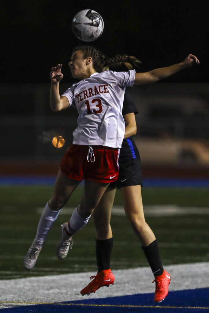 Mountlake Terrace’s Natalie Cardin (13) heads the ball during a soccer game between Shorewood and Mountlake Terrace at Shorewood Stadium in Shoreline, Washington on Thursday, Oct. 19, 2023. Shorewood won, 4-0. (Annie Barker / The Herald)
