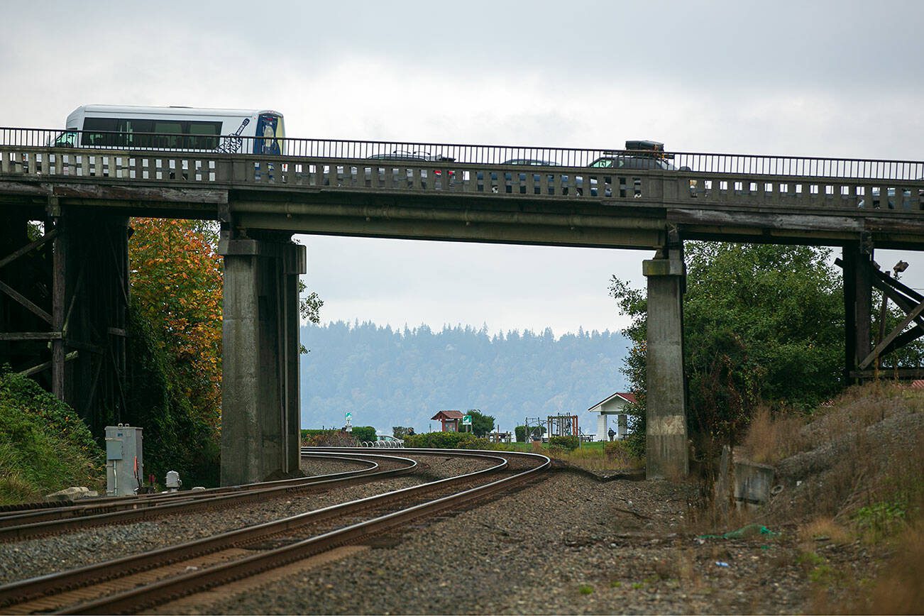 Traffic crosses the 525 bridge over the railroad tracks on Sunday, Oct. 22, 2023, in Mukilteo, Washington. (Ryan Berry / The Herald)