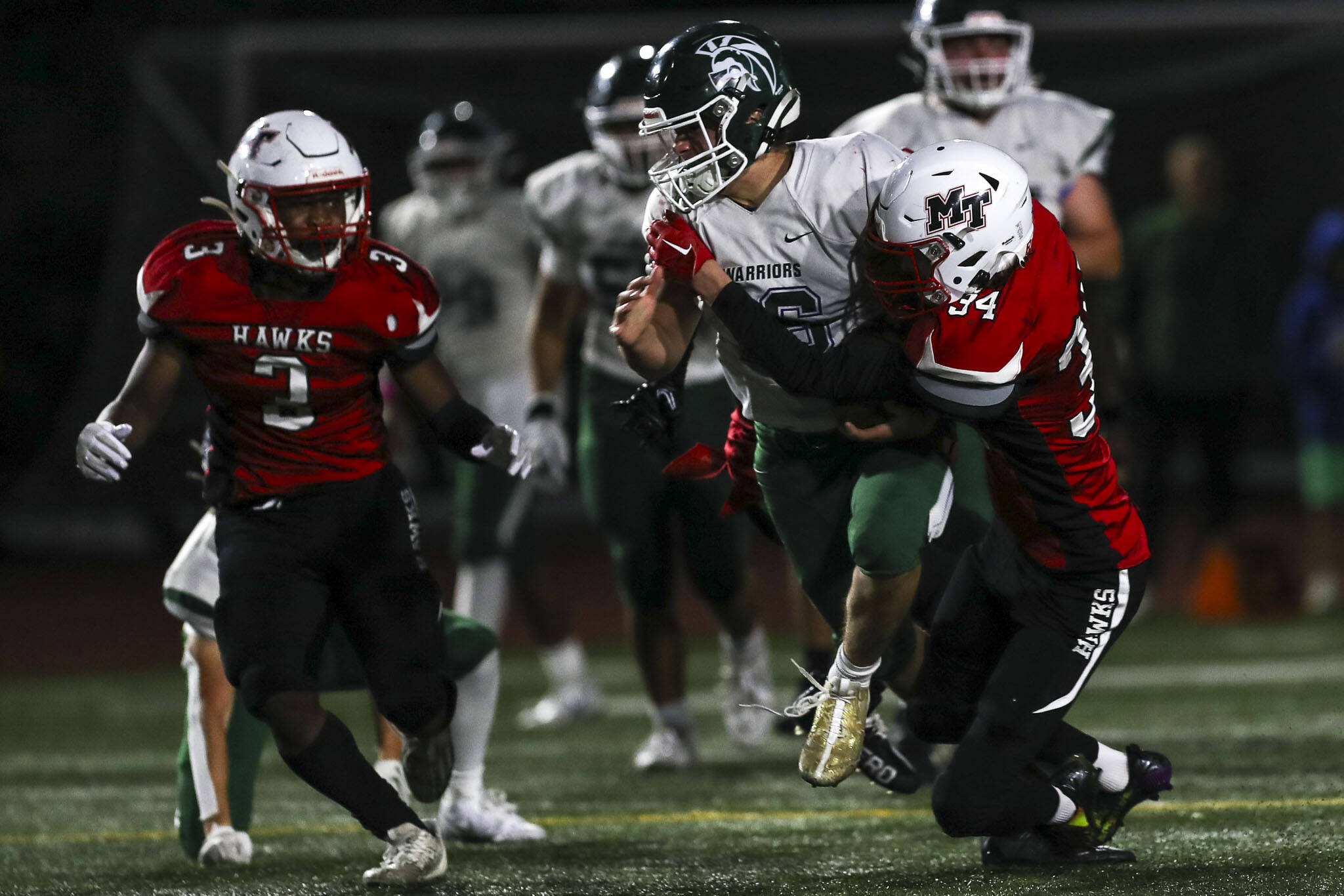 Edmonds-Woodway’s Chris Cruz-Akre (16) moves with the ball during a game between Edmonds-Woodway and Mountlake Terrace at Edmonds-Woodway Stadium in Edmonds, Washington on Friday, Oct. 20, 2023. Edmonds-Woodway won, 13-10. (Annie Barker / The Herald)