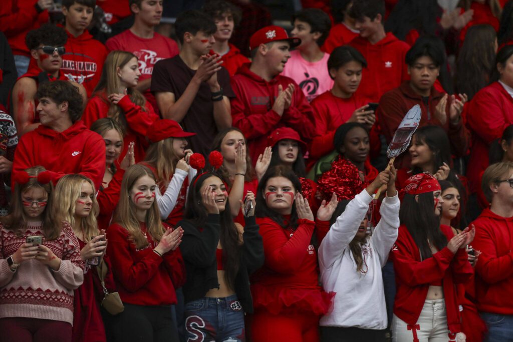 Fans cheer during a game between Edmonds-Woodway and Mountlake Terrace at Edmonds-Woodway Stadium in Edmonds, Washington on Friday, Oct. 20, 2023. Edmonds-Woodway won, 13-10. (Annie Barker / The Herald)
