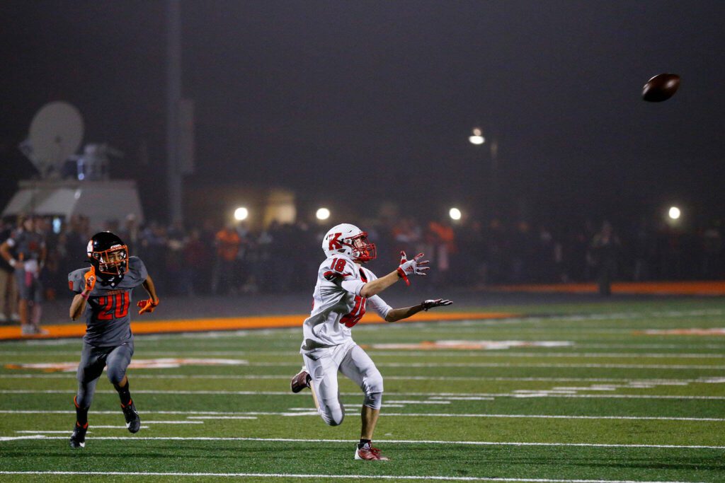 A Kings wideout hauls in a long pass against Granite Falls on Friday, Oct. 20, 2023, at Granite Falls High School in Granite Falls, Washington. (Ryan Berry / The Herald)
