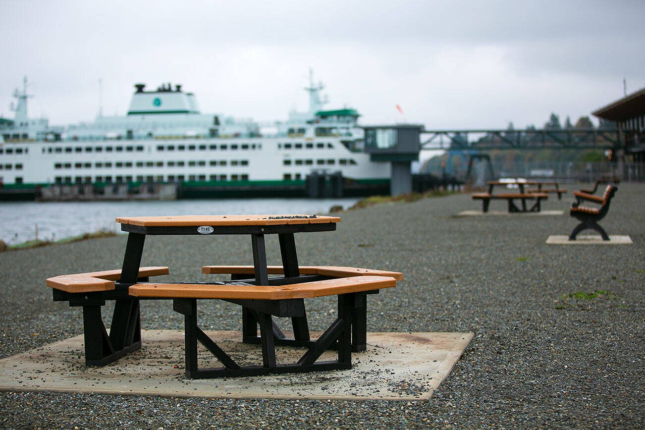 New benches and tables line the waterfront at a new park near the Mukilteo ferry terminal Sunday, Oct. 22, 2023, in Mukilteo, Washington. (Ryan Berry / The Herald)