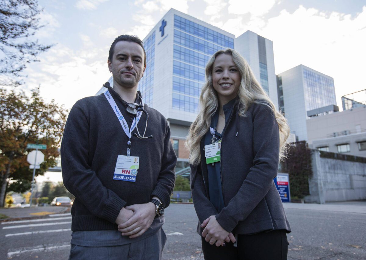 Registered nurses in front of the hospital