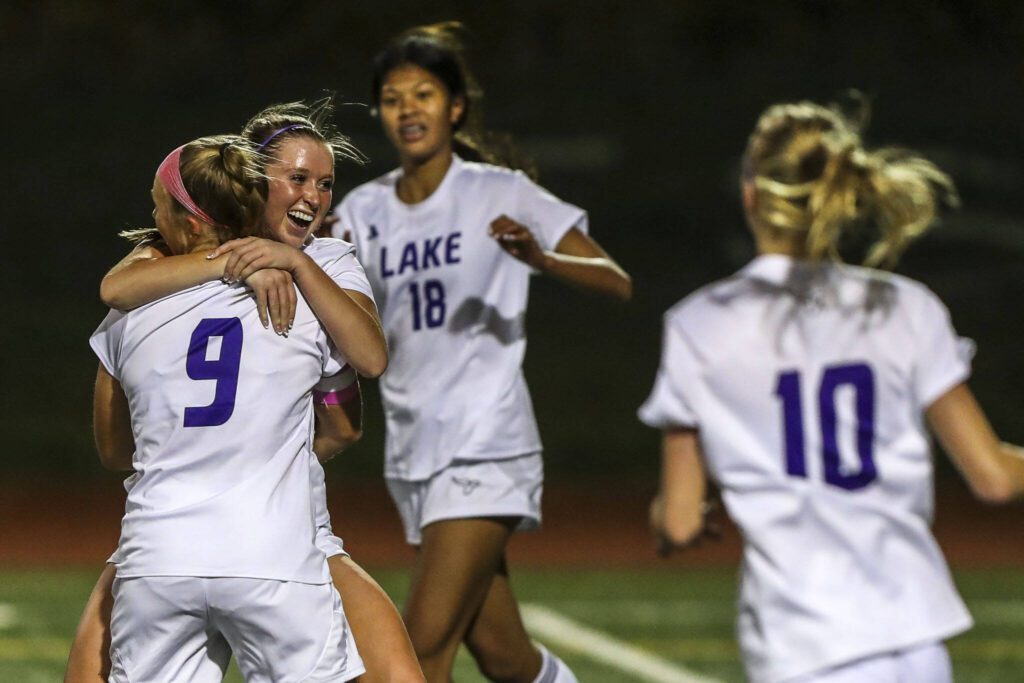 Lake Stevens players react to a goal during a game between Lake Stevens and Kamiak at Kamiak High School in Mukilteo, Washington on Monday, Oct. 23, 2023. Lake Stevens won, 4-2. (Annie Barker / The Herald)
