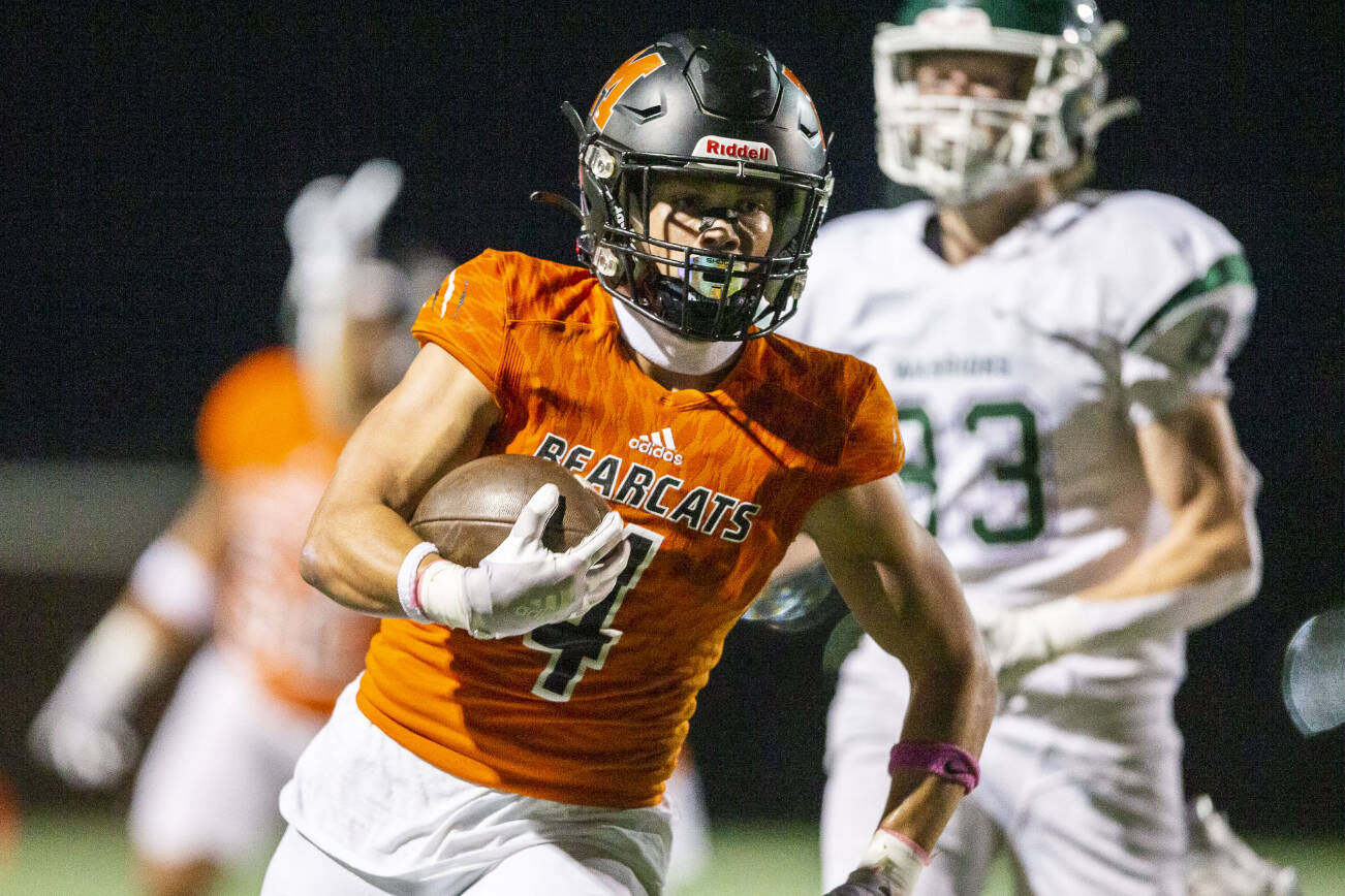 Monroe's Gavin Ranz runs the ball in for a touchdown during the game against Edmonds-Woodway on Friday, Oct. 13, 2023 in Monroe, Washington. (Olivia Vanni / The Herald)