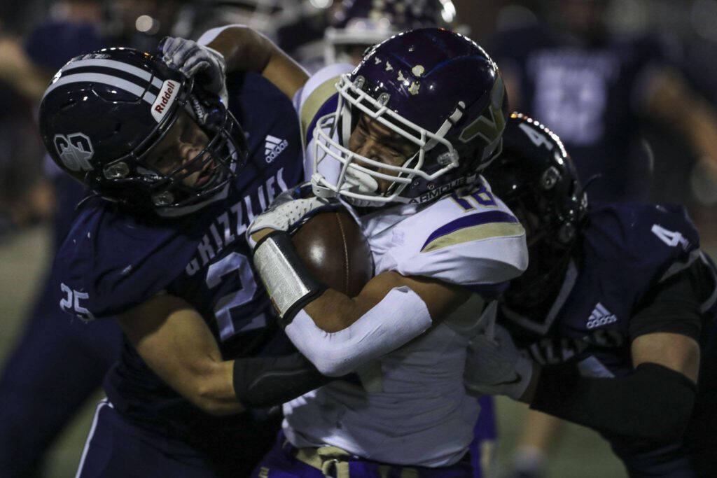 Lake Stevens’ Talha Rai (18) moves with the ball during a game between Glacier Peak and Lake Stevens at Veterans Memorial Stadium in Snohomish, Washington on Friday, Oct. 27, 2023. Lake Stevens won, 42-7. (Annie Barker / The Herald)
