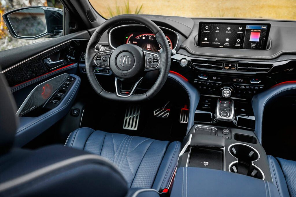 A sport steering wheel and sport pedals are part of the Acura MDX Type S interior design. (Acura)
