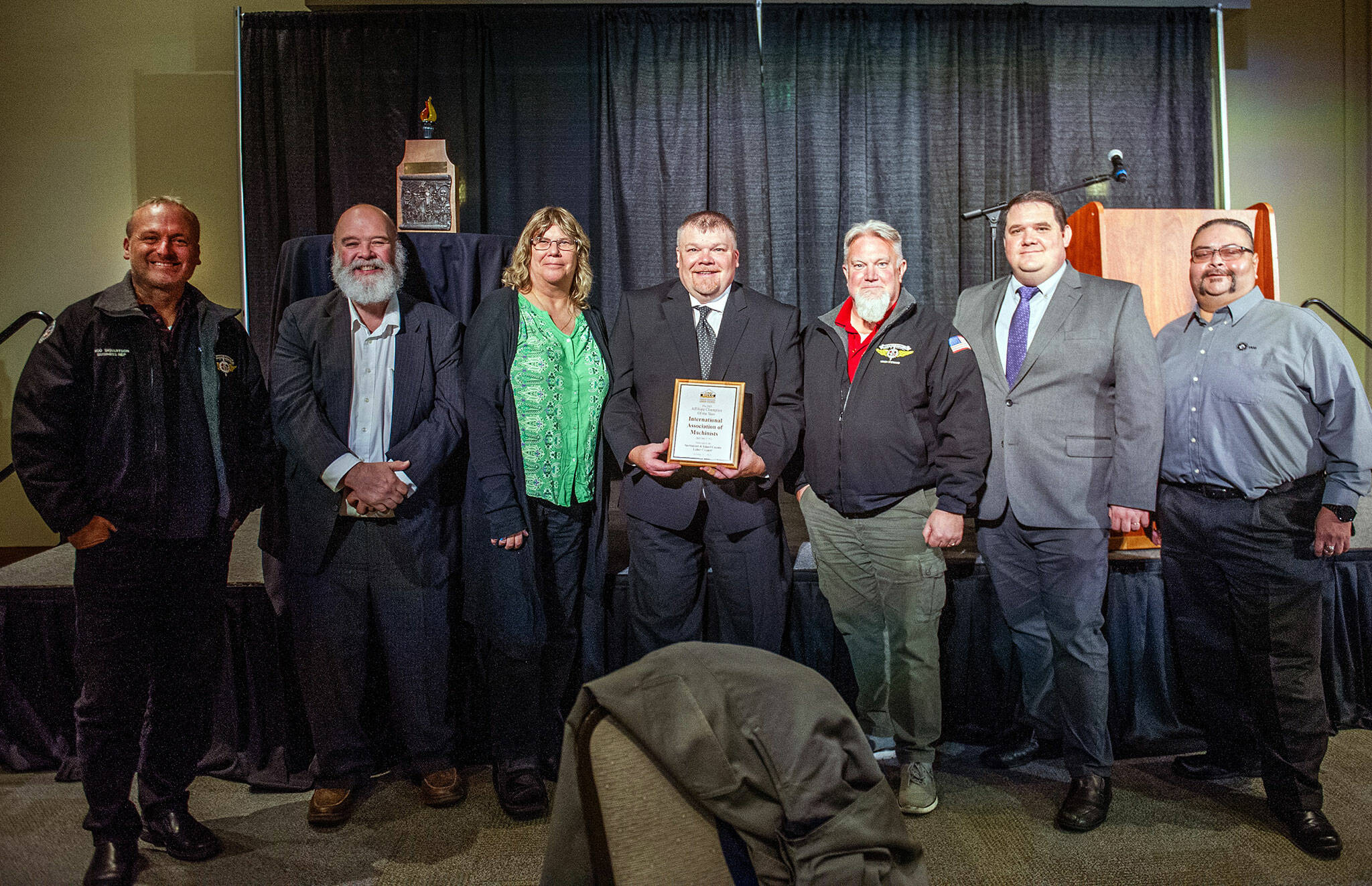 Members and supporters of the Snohomish and Island County Labor Council gather on Oct. 10 at the Edward D. Hansen Conference Center in Everett. The the Affiliate Labor Champion Award was given to the International Association of Machinists 751. Wes Heard, center, accepted the award on behalf of IAM 751. (Snohomish and Island County Labor Council)