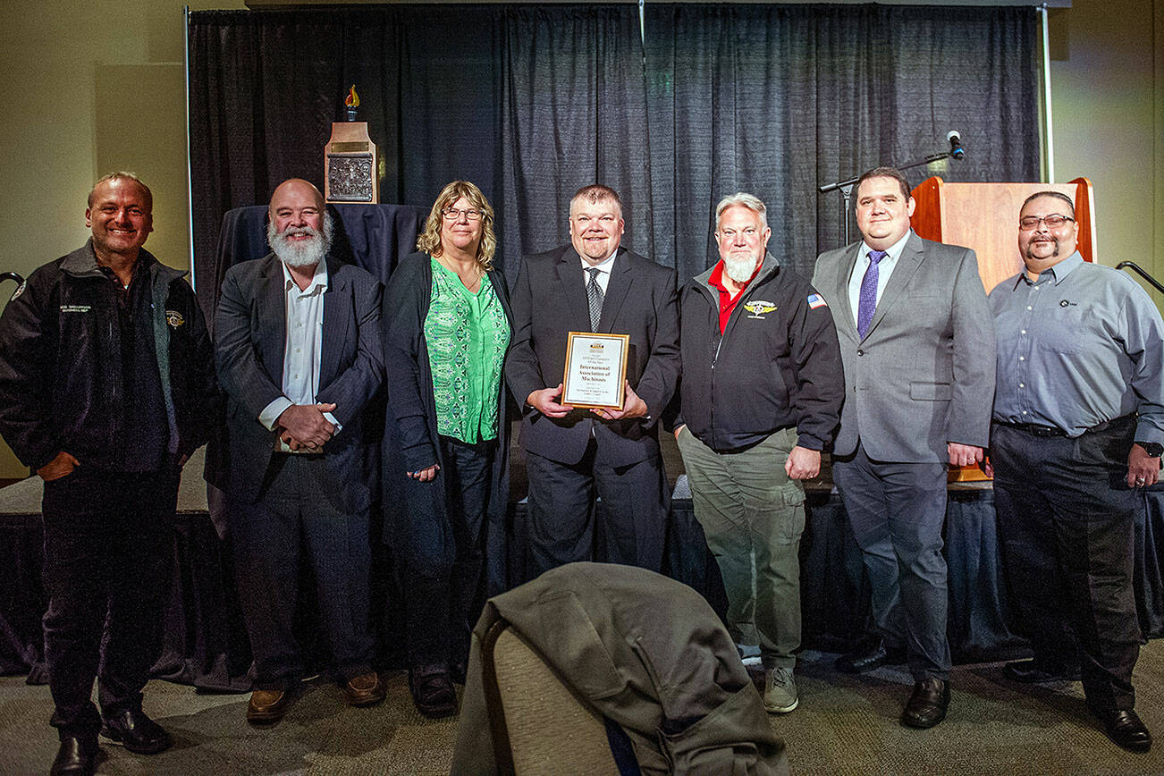 Members and supporters of the Snohomish and Island County Labor Council gather on Oct. 10 at the Edward D. Hansen Conference Center in Everett. The the Affiliate Labor Champion Award was given to the International Association of Machinists 751. Wes Heard, center, accepted the award on behalf of IAM 751. Photo credit: Snohomish and Island County Labor Council.