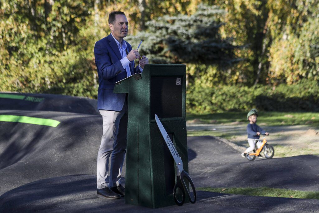 Marysville Mayor Jon Nehring presents a new pump track for bikes at Jennings Nature Park in Marysville. (Annie Barker / The Herald)
