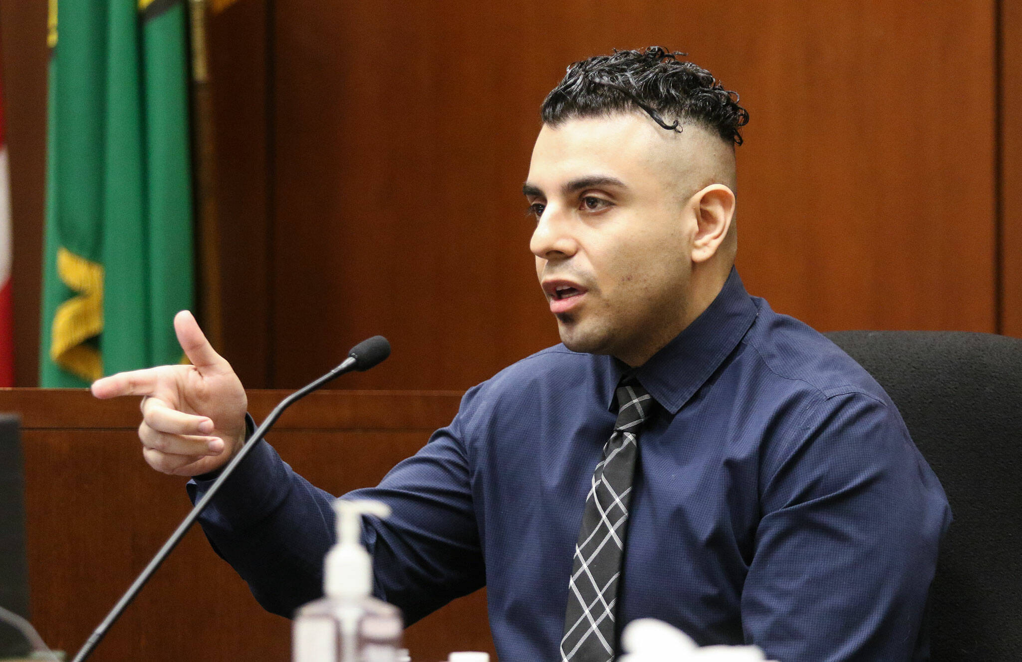 Claiming a man pointed a gun at him, Kevin Rodriguez testifies in court at the Snohomish County Courthouse on Thursday, June 10, 2021, in Everett, Washington. Rodriguez was convicted of manslaughter for killing Evodio Garcia Martinez. (Andy Bronson / The Herald)
