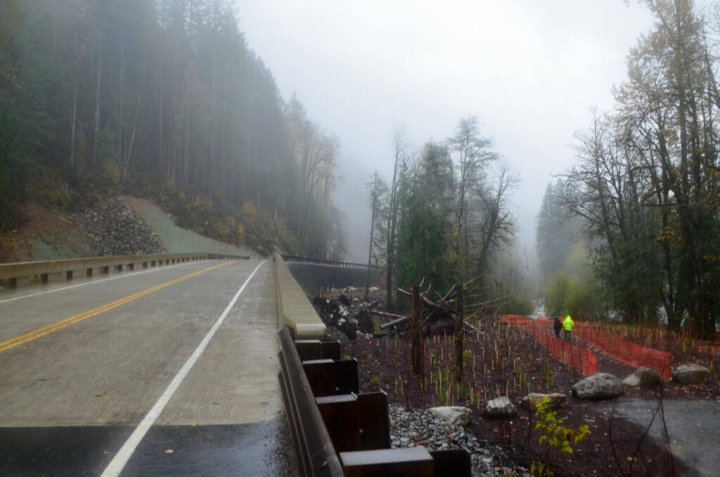 A new 180-foot bridge, left, helps connect Index to the Wild Sky Wilderness on Saturday, Nov. 4, 2023, near Index, Washington. (Jordan Hansen / The Herald)
