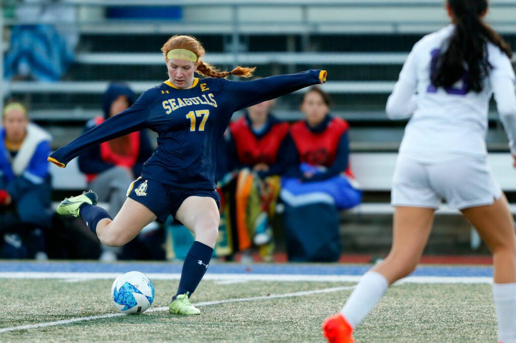 Everett’s Sophia Munro sends the ball upfield during a district playoff matchup against Oak Harbor on Thursday, Nov. 2, 2023, at Shoreline Stadium in Shoreline, Washington. (Ryan Berry / The Herald)
