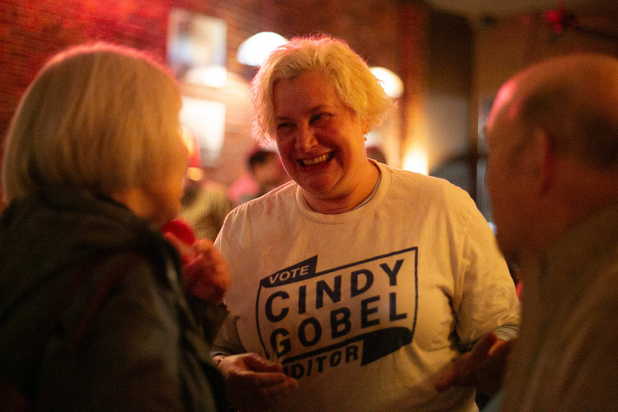 Cindy Gobel, running for Snohomish County Auditor, speaks with supporters during an election night party at Vintage Cafe on Tuesday, Nov. 7, 2023, in Everett, Washington. (Ryan Berry / The Herald)
