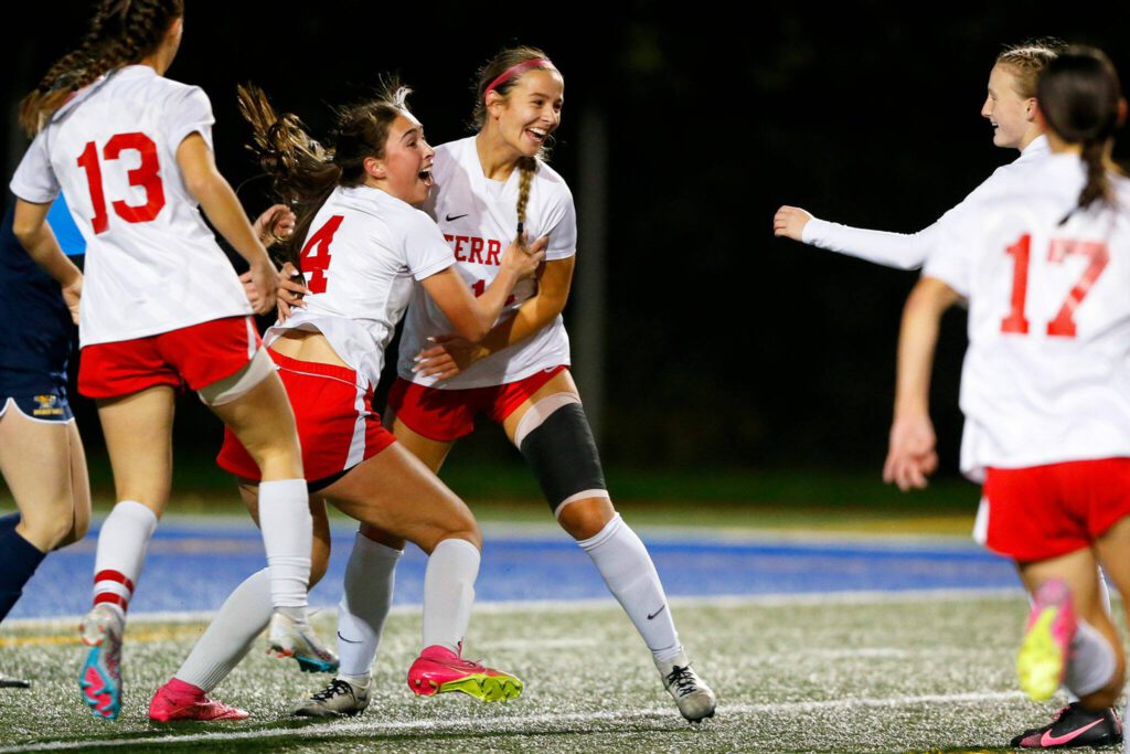 Mountlake Terrace celebrates an early goal by junior Claire August (4) during a district playoff matchup against Ferndale on Thursday, Nov. 2, 2023, at Shoreline Stadium in Shoreline, Washington. (Ryan Berry / The Herald)
