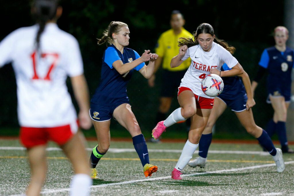 Mountlake Terrace’s Claire August retains possession of the ball during a district playoff matchup against Ferndale on Thursday, Nov. 2, 2023, at Shoreline Stadium in Shoreline, Washington. (Ryan Berry / The Herald)
