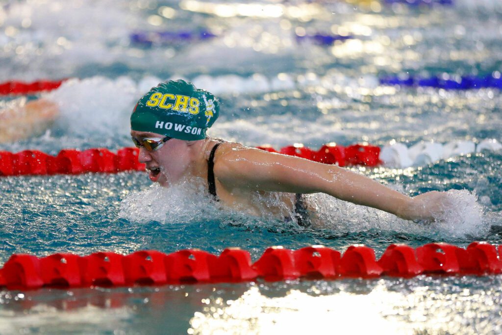Shorecrest junior Aila Howson swims the butterfly in the 200-yard individual medley during the Class 3A District 1 championships on Nov. 4 at the Snohomish Aquatic Center in Snohomish. (Ryan Berry / The Herald)
