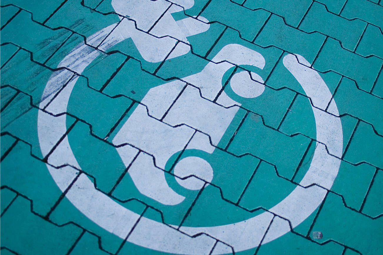 Car charging sign painted on the ground. electric vehicles ev