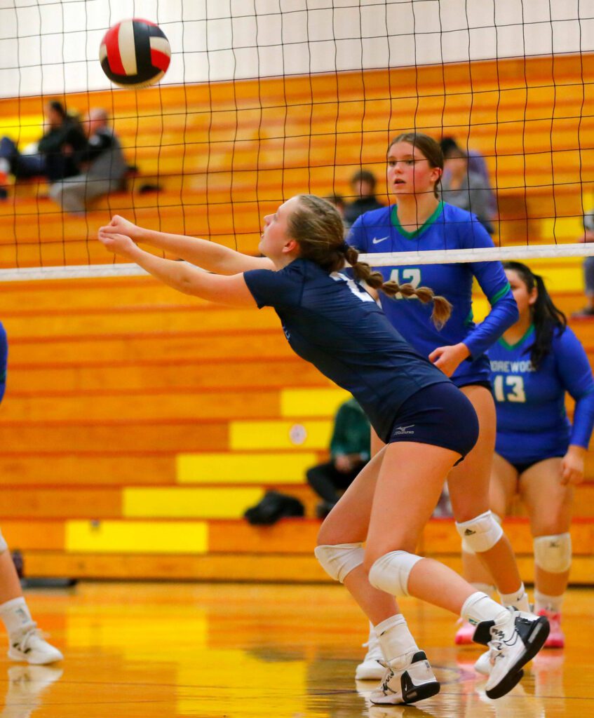 Meadowdale’s Laiken Thoesen saves the ball during a Wesco 3A District volleyball matchup against Shorewood on Thursday, Nov. 9, 2023, at Marysville Pilchuck High School in Marysville, Washington. (Ryan Berry / The Herald)
