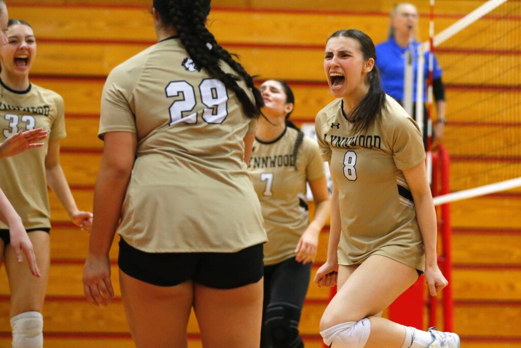 Lynnwood’s Ady Martin, right, celebrates with her teammates during a Wesco 3A District volleyball matchup against Shorecrest on Thursday, Nov. 9, 2023, at Marysville Pilchuck High School in Marysville, Washington. (Ryan Berry / The Herald)
