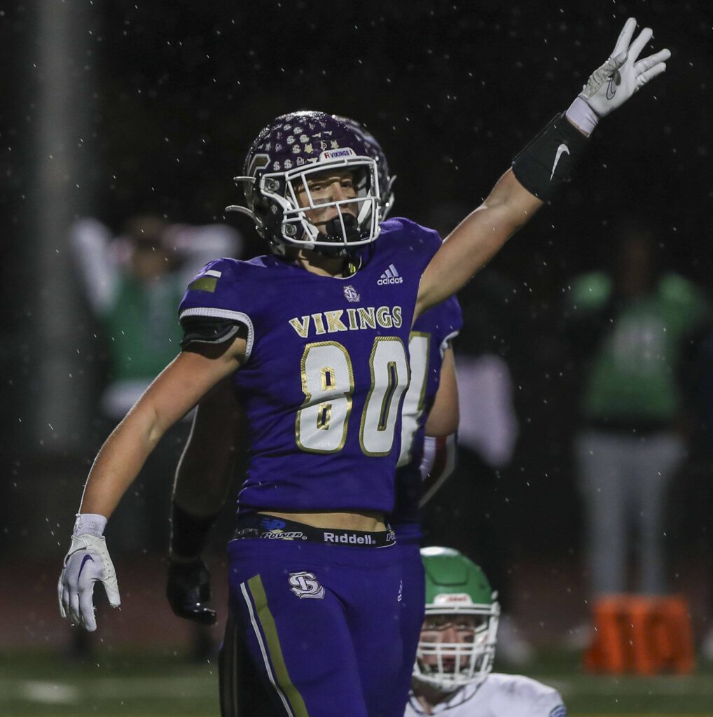 Lake Stevens’ Keagan Howard (80) celebrates during a football game between Lake Stevens and Woodinville at Lake Stevens High School in Lake Stevens, Washington on Friday, Nov. 10, 2023. Lake Stevens won, 41-0. (Annie Barker / The Herald)