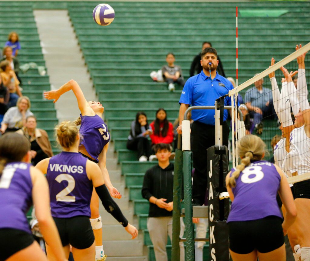 Lake Stevens’ Laura Eichert goes for a kill against North Creek during the Wesco 4A district 1/2 championship match Saturday, Nov. 11, 2023, at Henry M. Jackson High School in Mill Creek, Washington. (Ryan Berry / The Herald)
