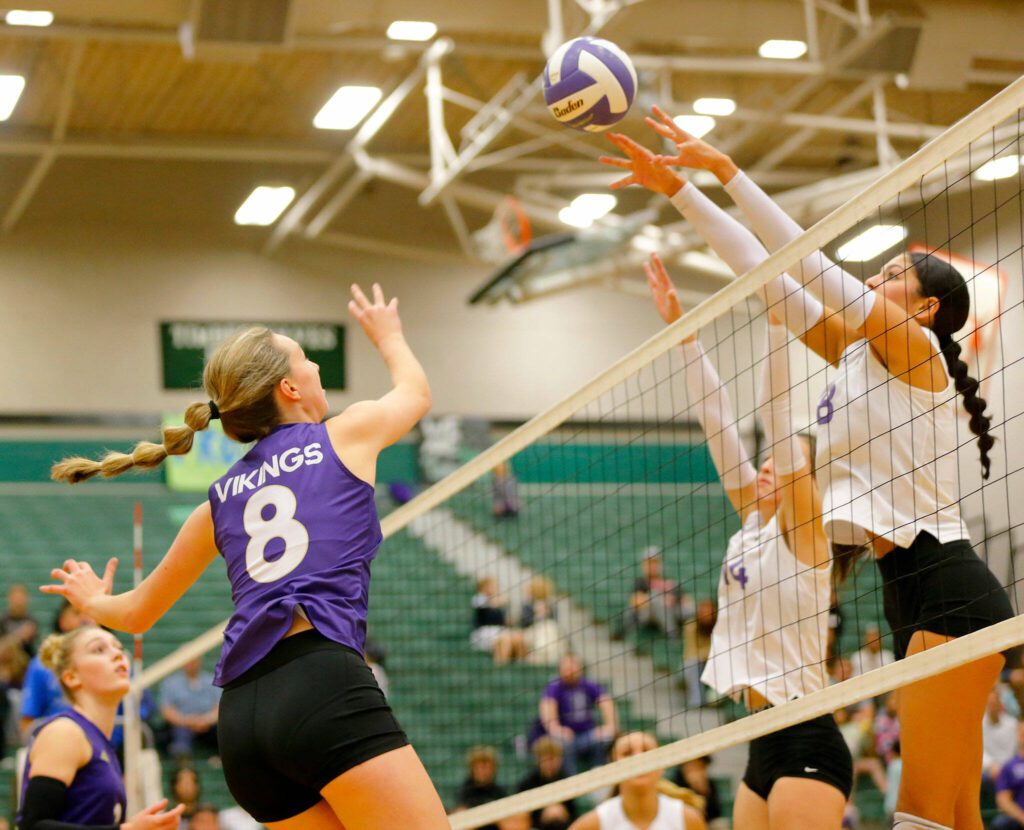 Lake Stevens’ Claire Mackintosh tries to get the ball over two blockers against North Creek during the Wesco 4A district 1/2 championship match Saturday, Nov. 11, 2023, at Henry M. Jackson High School in Mill Creek, Washington. (Ryan Berry / The Herald)
