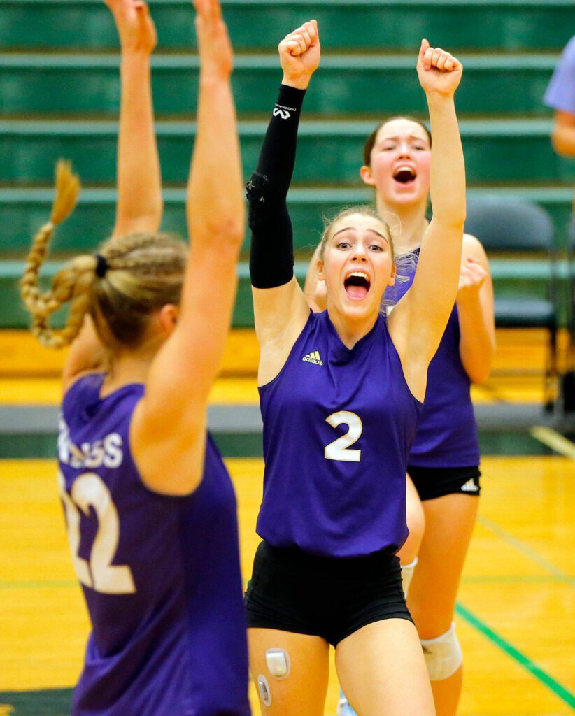 Lake Stevens senior Katelyn Eichert celebrates her sister Laura’s point against North Creek during the Wesco 4A district 1/2 championship match Saturday, Nov. 11, 2023, at Henry M. Jackson High School in Mill Creek, Washington. (Ryan Berry / The Herald)
