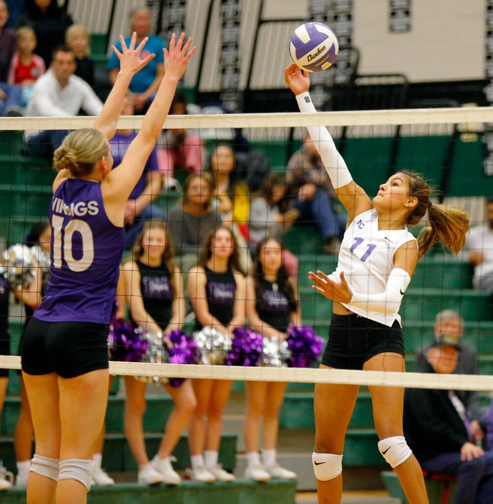North Creek’s Jocelyn Grieser sends the ball back over the net against Lake Stevens during the Wesco 4A district 1/2 championship match Saturday, Nov. 11, 2023, at Henry M. Jackson High School in Mill Creek, Washington. (Ryan Berry / The Herald)
