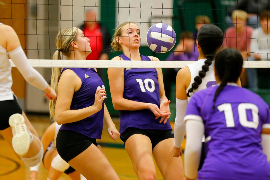 Lake Stevens’ Jayci Scrivens tries to save a blocked ball in front of the net against North Creek during the Wesco 4A district 1/2 championship match Saturday, Nov. 11, 2023, at Henry M. Jackson High School in Mill Creek, Washington. (Ryan Berry / The Herald)
