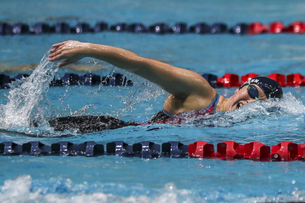 Glacier Peak’s Alena Lehmann swims in of the 500-yard freestyle during the Class 4A girls state swim and dive championships Saturday at King County Aquatic Center in Federal Way. (Annie Barker / The Herald)
