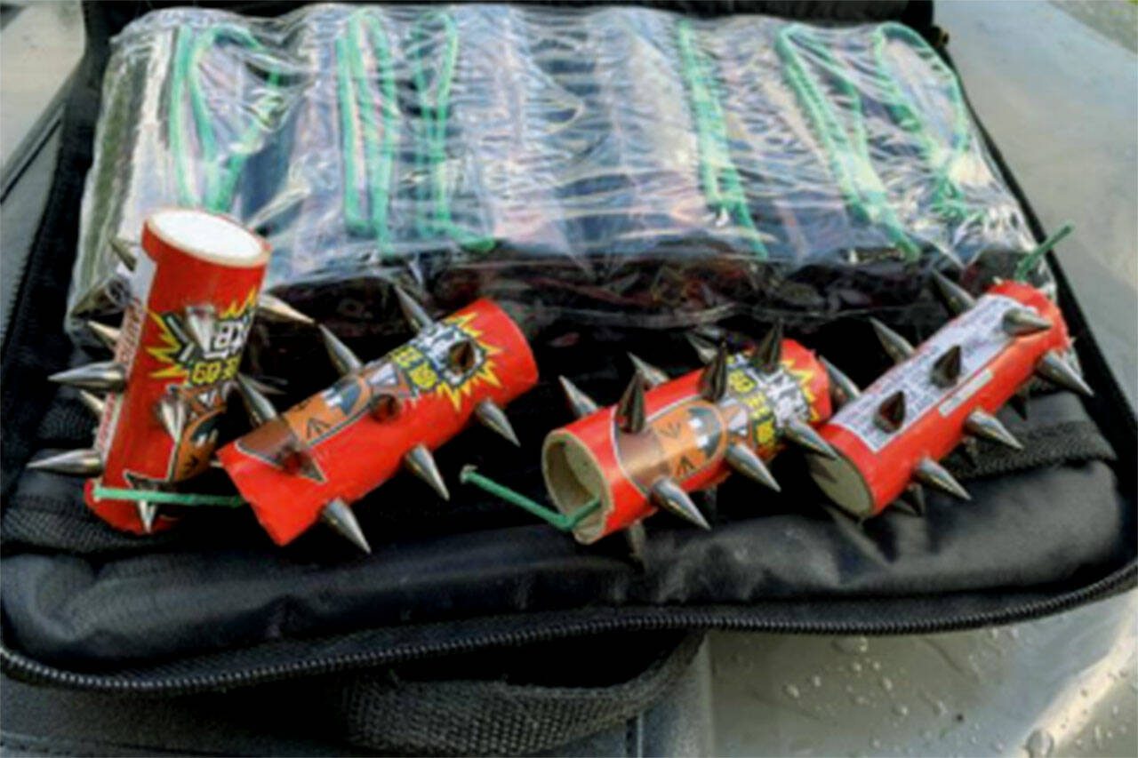 This photo shows consumer fireworks wrapped with metal spikes that federal agents say could be used as an explosive device. (U.S. Attorney’s Office)