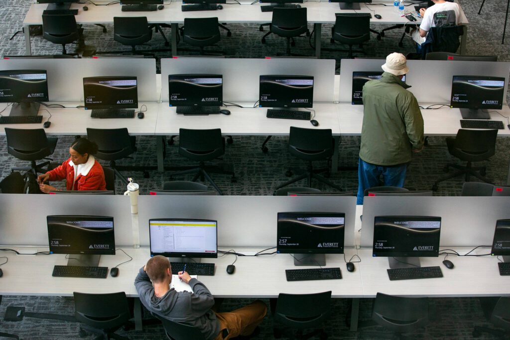 Students work on the second flood prior to a ribbon cutting ceremony of the new Cascade Learning Center on Thursday, Sept. 28, 2023, at Everett Community College in Everett, Washington. (Ryan Berry / The Herald)
