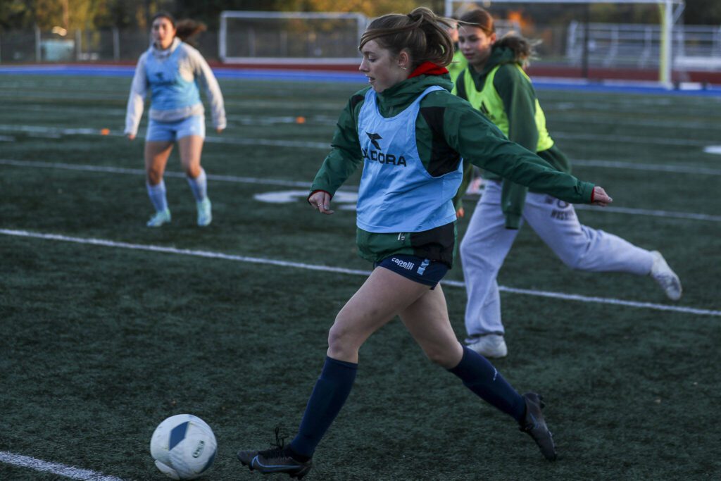 Members of the Shorecrest girls soccer team practice Wednesday at Shoreline Stadium in Shoreline. (Annie Barker / The Herald)
