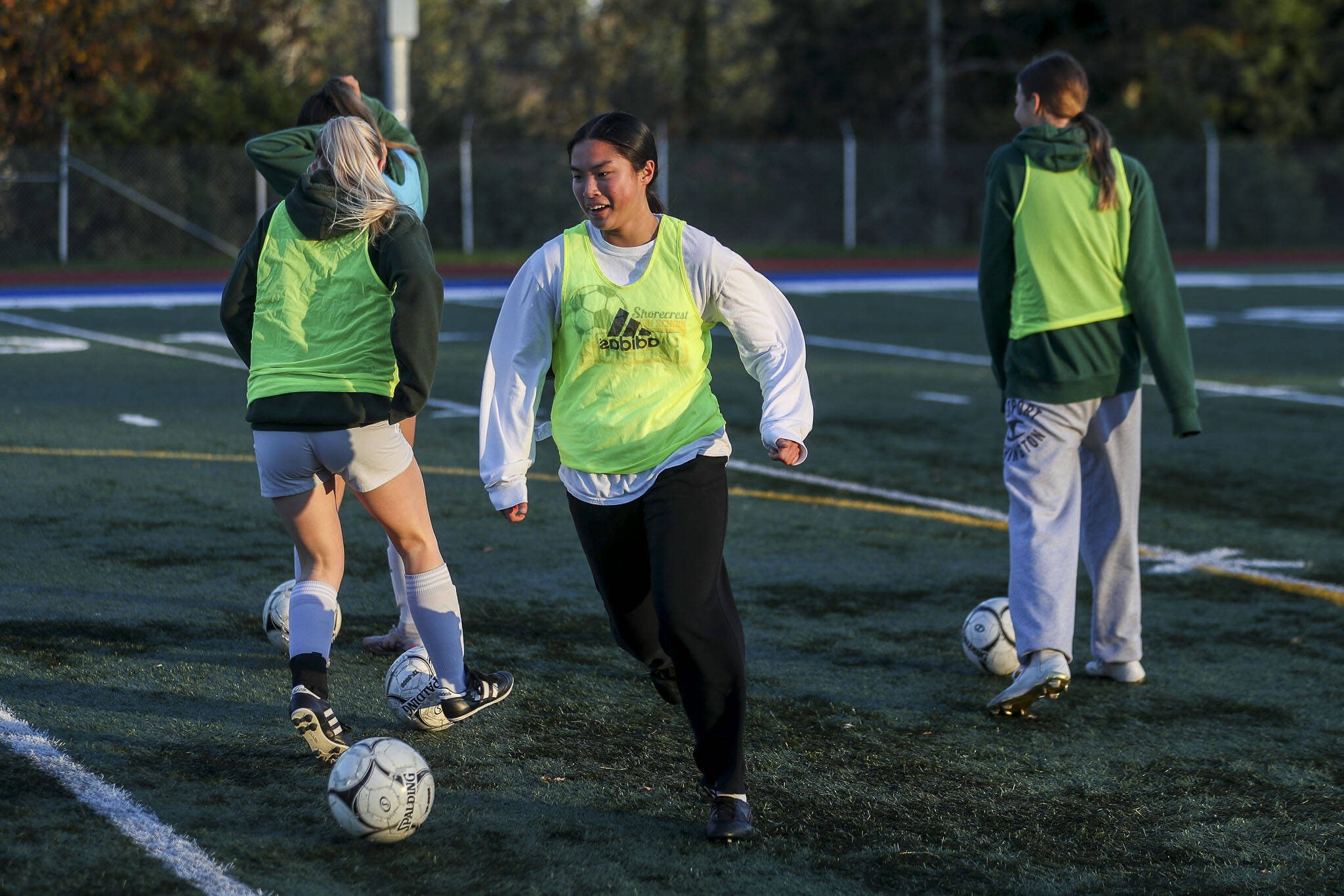 Tayvi Khann (8) moves with the ball during a Shorecrest girls soccer team practice at Shoreline Stadium in Shoreline, Washington on Wednesday, Nov. 15, 2023. (Annie Barker / The Herald)