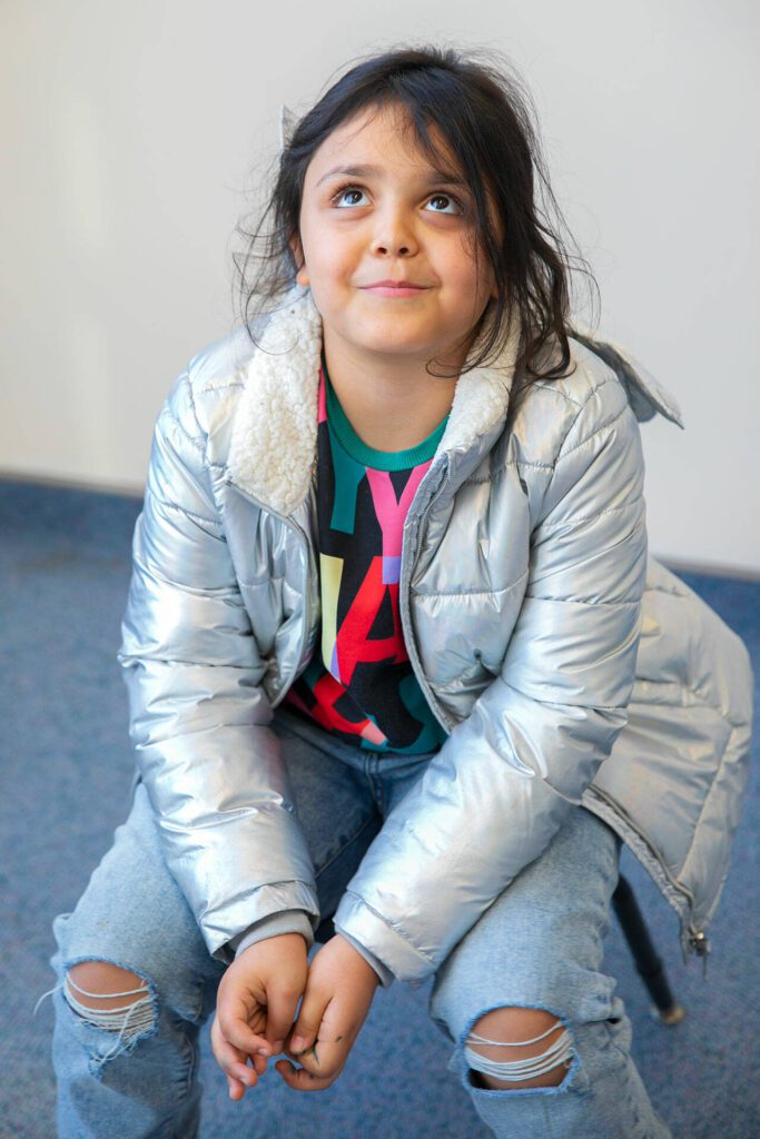 Soliana takes a moment to think about her response to a question during an interview with the Herald on Monday, Nov. 20, 2023, at Jackson Elementary School in Everett, Washington. (Ryan Berry / The Herald)
