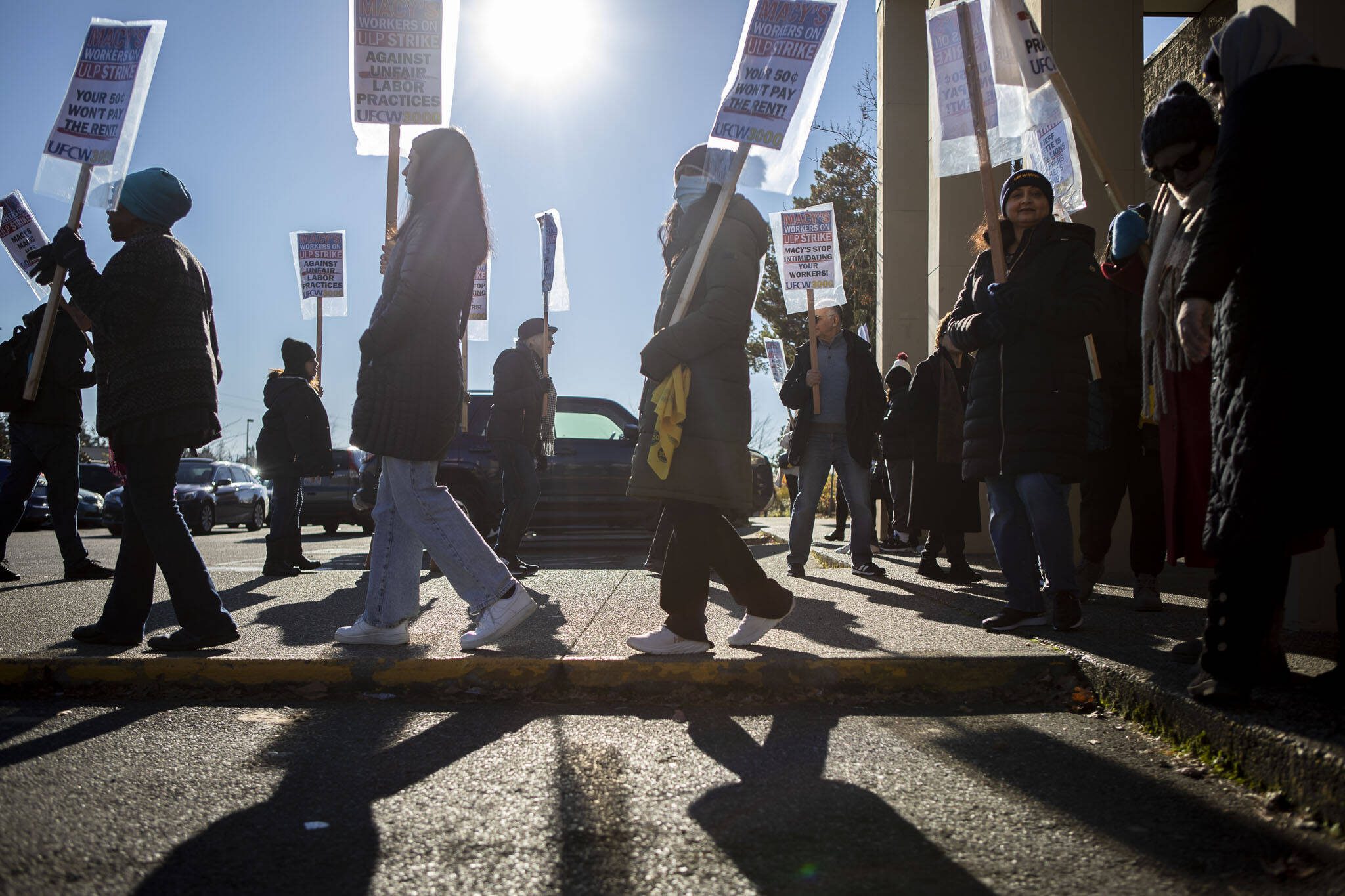 Macy’s workers strike on Black Friday at the Alderwood Mall in Lynnwood, Washington, on Friday, Nov. 24, 2023. (Annie Barker / The Herald)